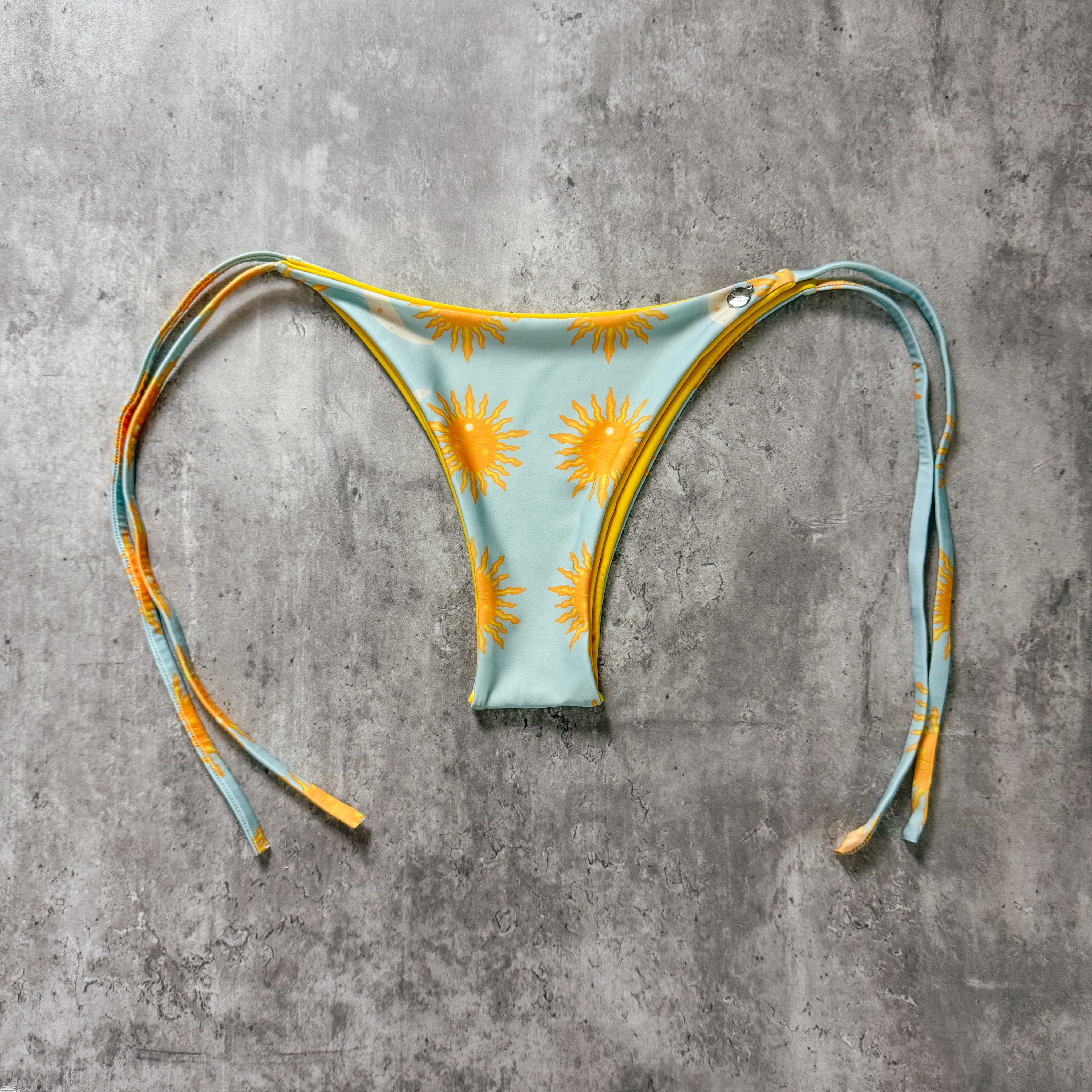 Bottom Totoritas Sol y luna print reversible a amarillo
