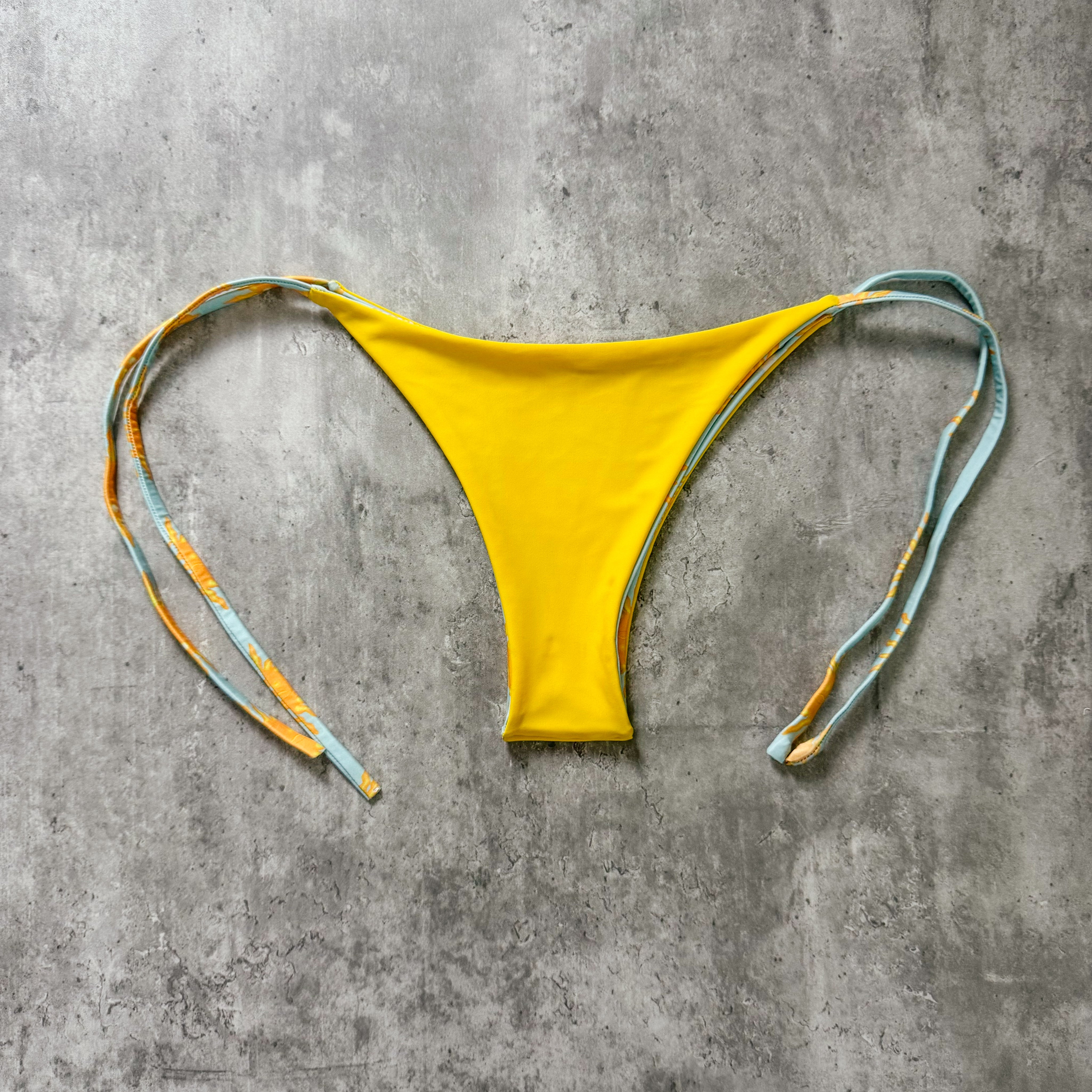 Bottom Totoritas Sol y luna print reversible a amarillo