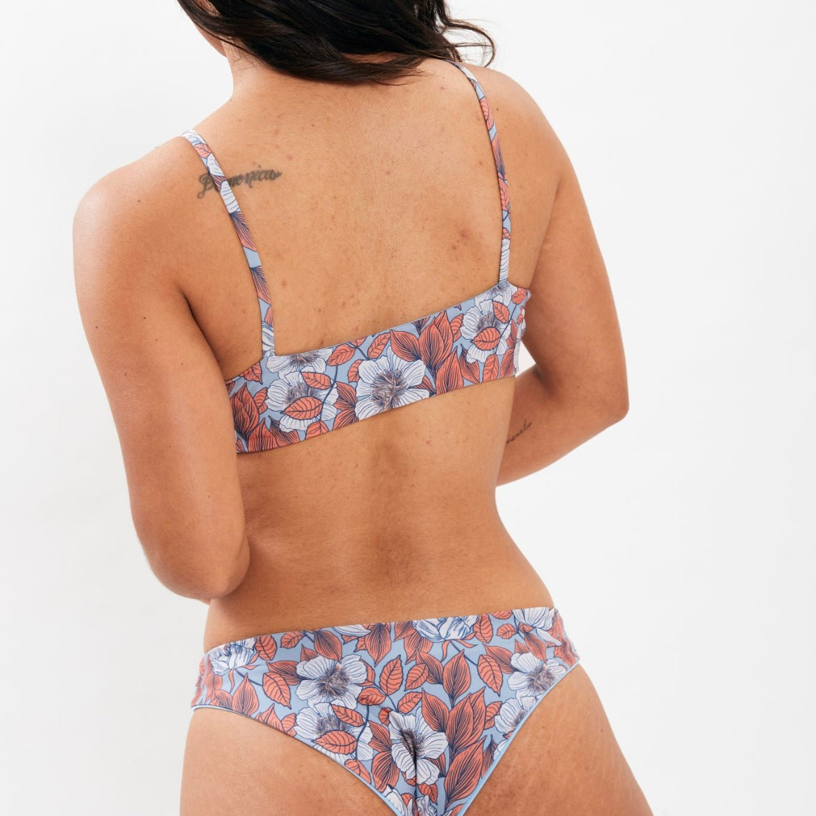 Top Santa María Flores celeste reversible celeste