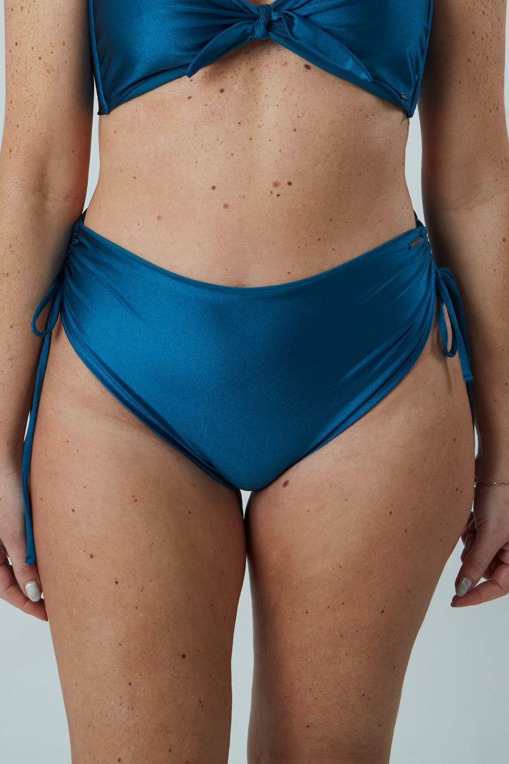 Bottom Pucusana Peacock satinado reversible a mate