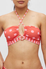 Top Nasau Lunares y rayas coral reversible a rosa