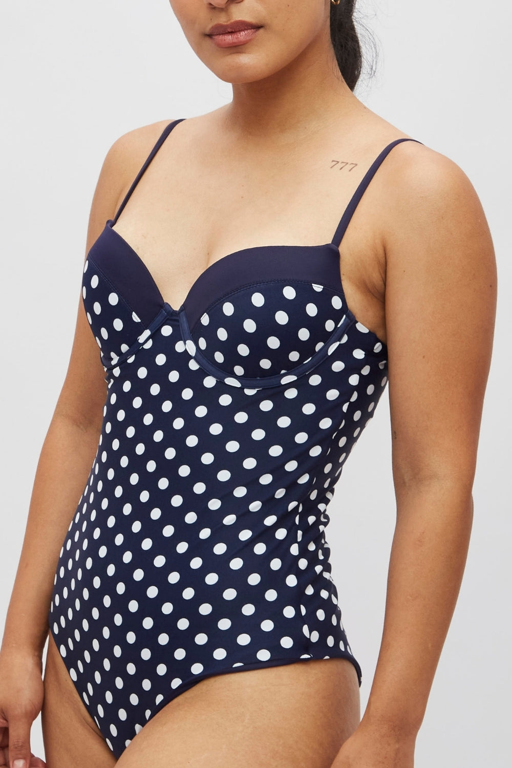 Entera Varadero Lunares azul marino bicolor