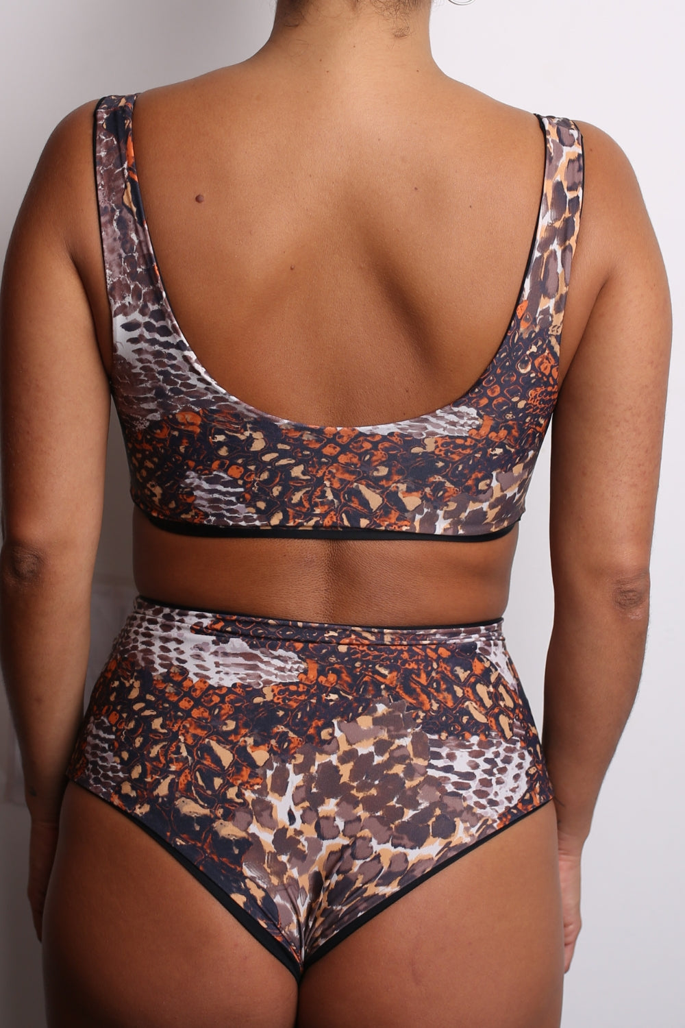 Top Saona Pitón de fuego reversible a negro