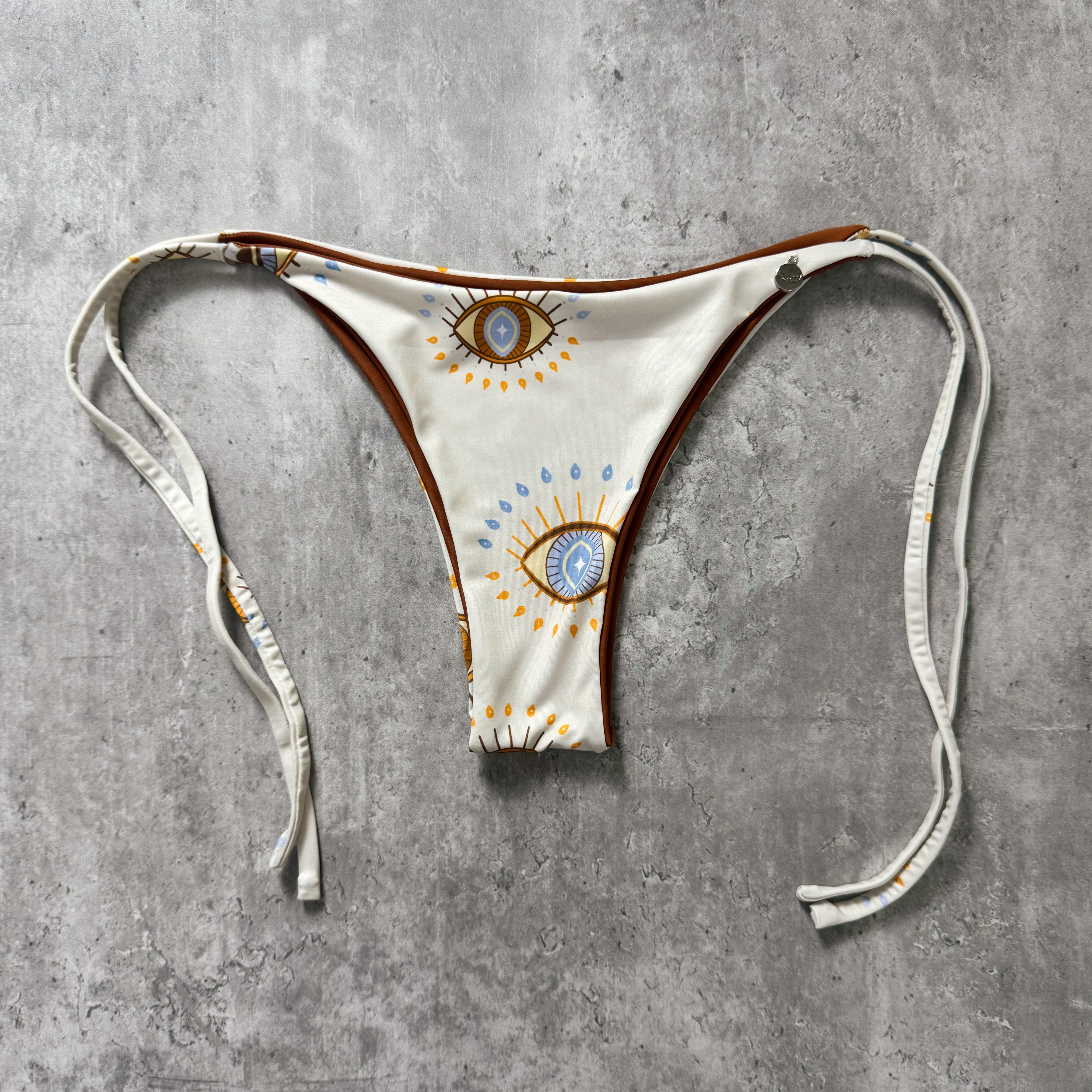 Bottom totoritas ojos reversible a tierra