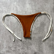 Bottom totoritas ojos reversible a tierra