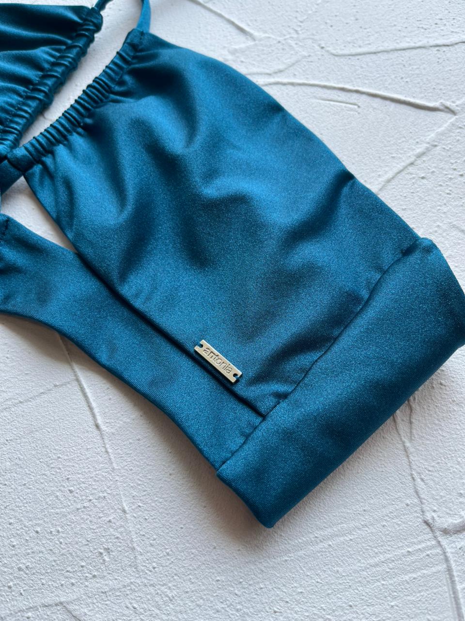 Top Nasau Peacock satinado reversible a mate