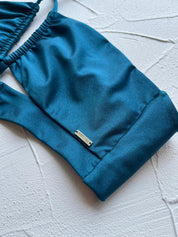 Top Nasau Peacock satinado reversible a mate